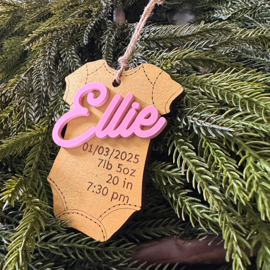 Baby's First Holiday Onesie Ornament with gold, pink, blue