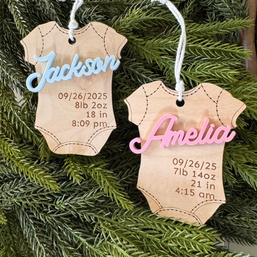 Baby's First Holiday Onesie Ornament with gold, pink, blue