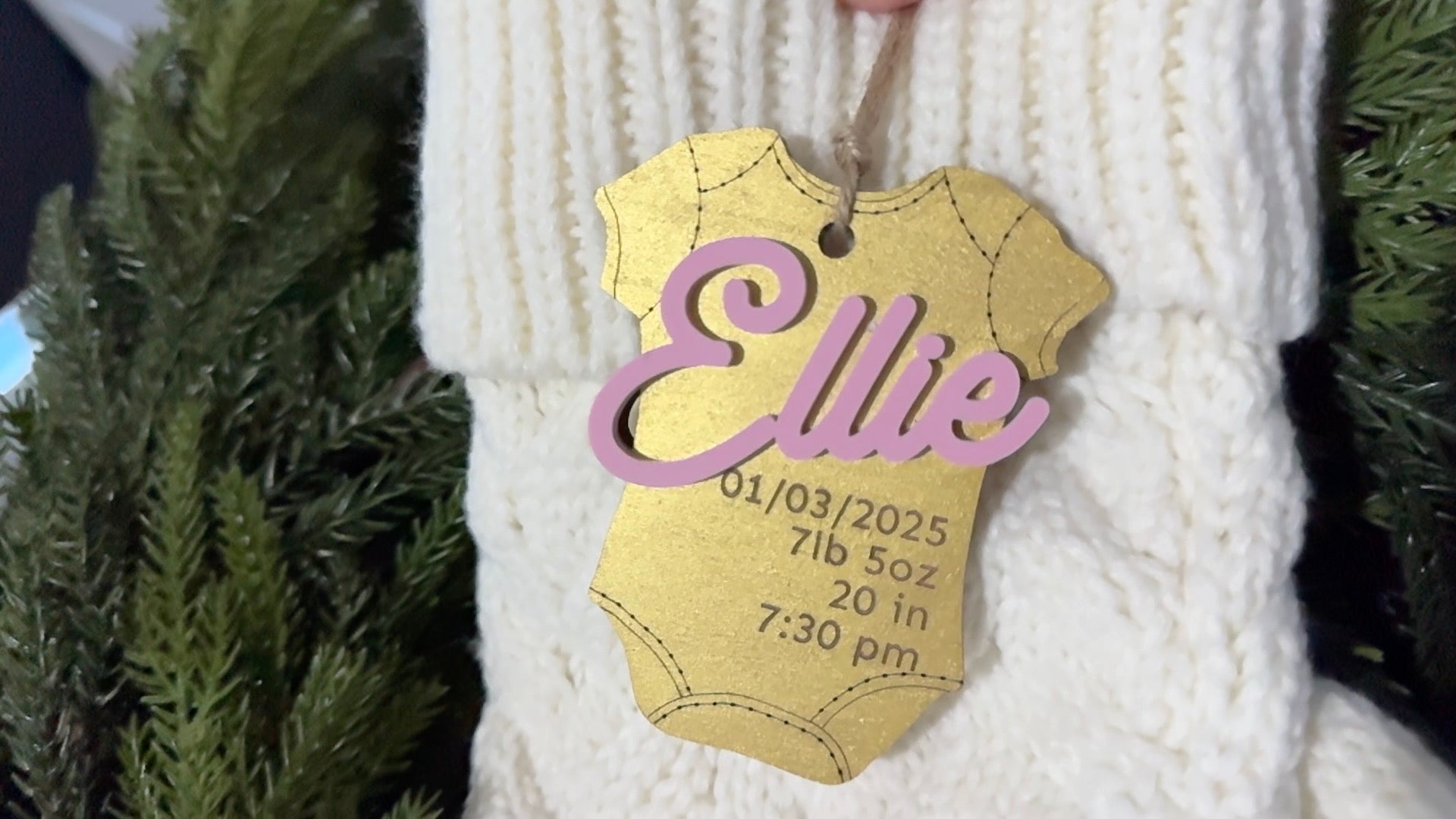 Baby's First Holiday Onesie Ornament with gold, pink, blue