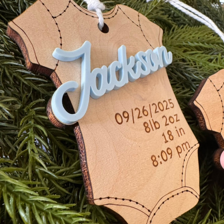 Baby's First Holiday Onesie Ornament with gold, pink, blue